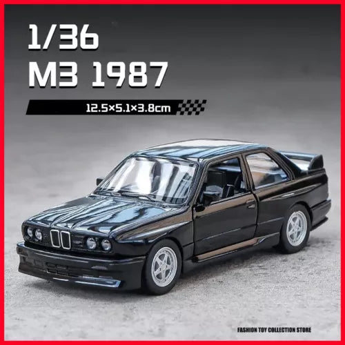 Diecast alloy sports car model, black sedan with silver grille and white wheels