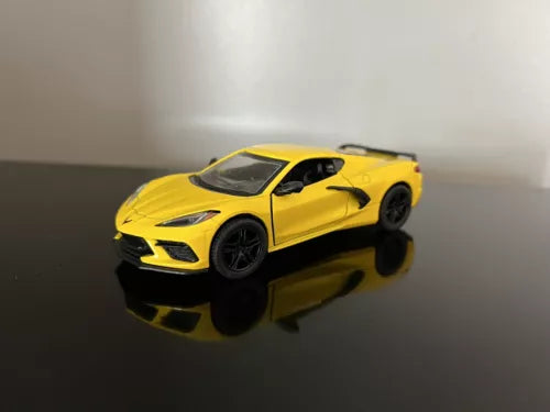 Yellow diecast sports car toy with black wheels, front 3/4 view, 1:36 scale
