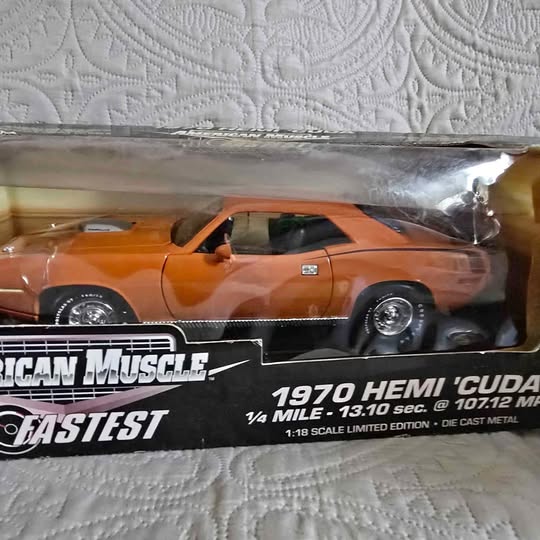 Orange 1970 Hemi Cuda diecast muscle car in display box