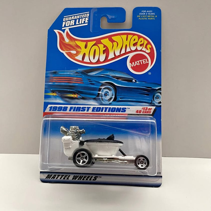 Hot Wheels white diecast race car in clear blister packaging