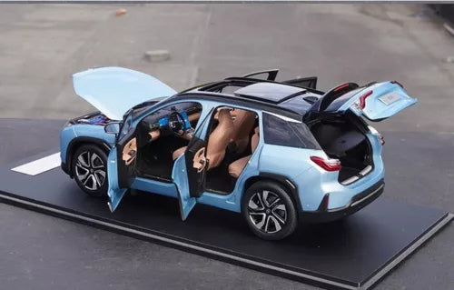 Blue 1/18 scale NIO ES6 diecast SUV model with doors open and black interior