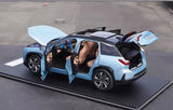 Blue 1/18 scale NIO ES6 diecast SUV model with doors open and black interior
