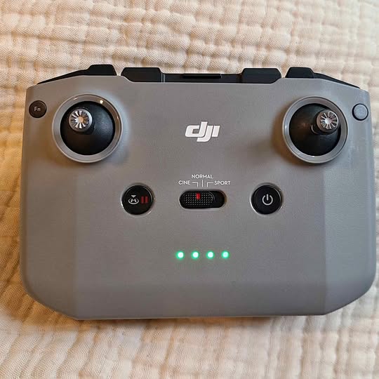 DJI Mini 3 Pro remote controller with dual joysticks and control buttons