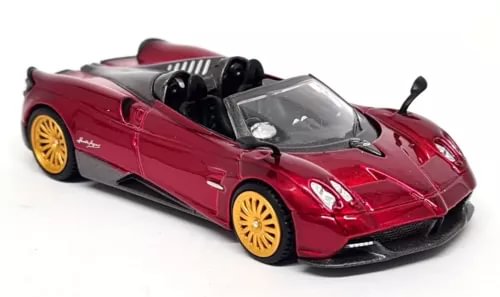 Red Pagani Huayra roadster diecast model car with gold wheels, open cockpit
