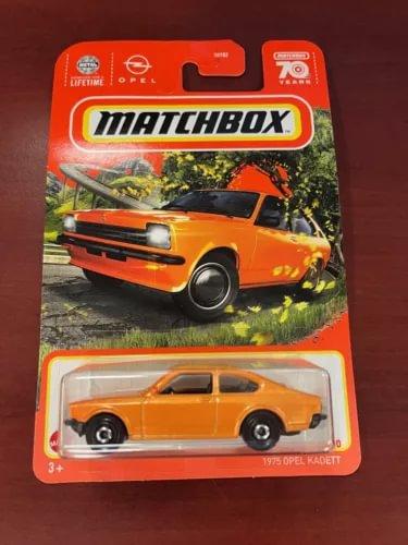 Orange 1:64 Opel Kadett diecast toy car in Matchbox blister pack