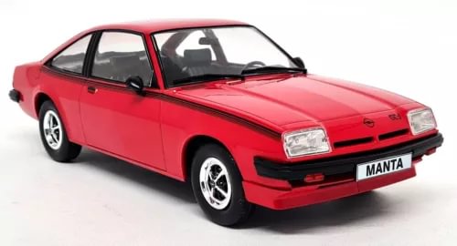 Red 1:18 scale diecast coupe model car with chrome wheels and front grille