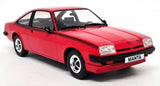 Red 1:18 scale diecast coupe model car with chrome wheels and front grille
