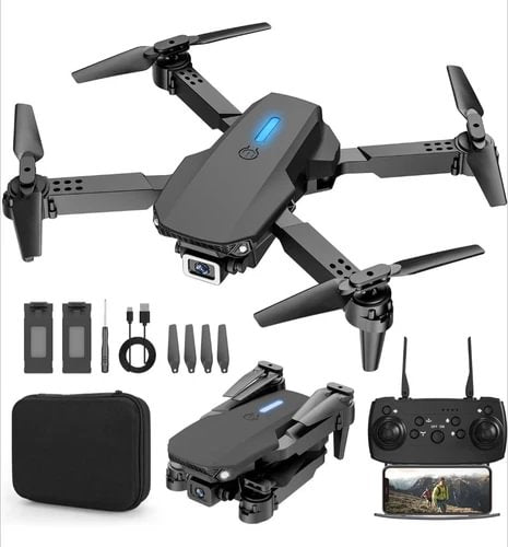Foldable quadcopter drone kit with dual cameras, controller, extra props, and carrying case
