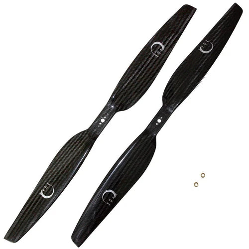 Carbon fiber propeller pair blades for RC quadcopter drone, black with mounting holes.