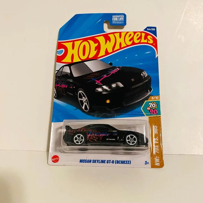 Hot Wheels Nissan Skyline GT-R (BCNR33) black diecast car in blister pack