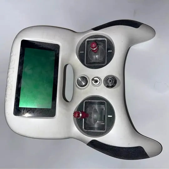 White drone controller with display screen, joysticks, buttons, and camera ports