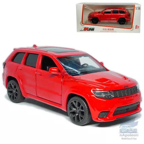 Red diecast SUV model car toy with black wheels, front 3/4 view