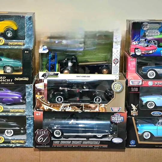 1:18 diecast car model in box, black pickup truck with chrome details