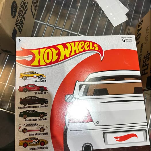 Hot Wheels die-cast car blister pack with red-and-white car illustration