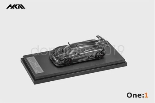 HKM 1:64 diecast car model in black with chrome accents on display base