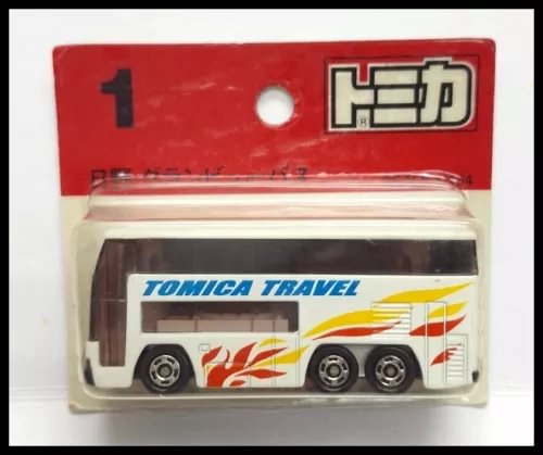 TOMICA Travel diecast bus toy with white and red livery, front view