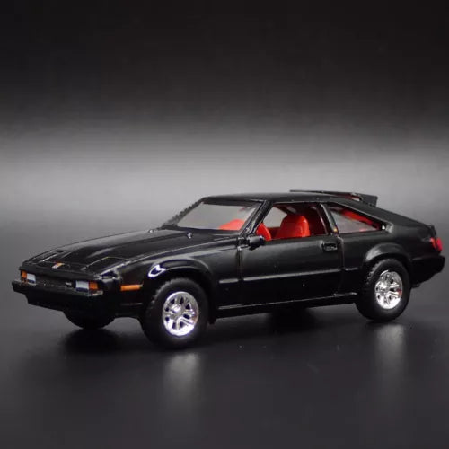 Black 1:64 diecast model car with red interior, front side view