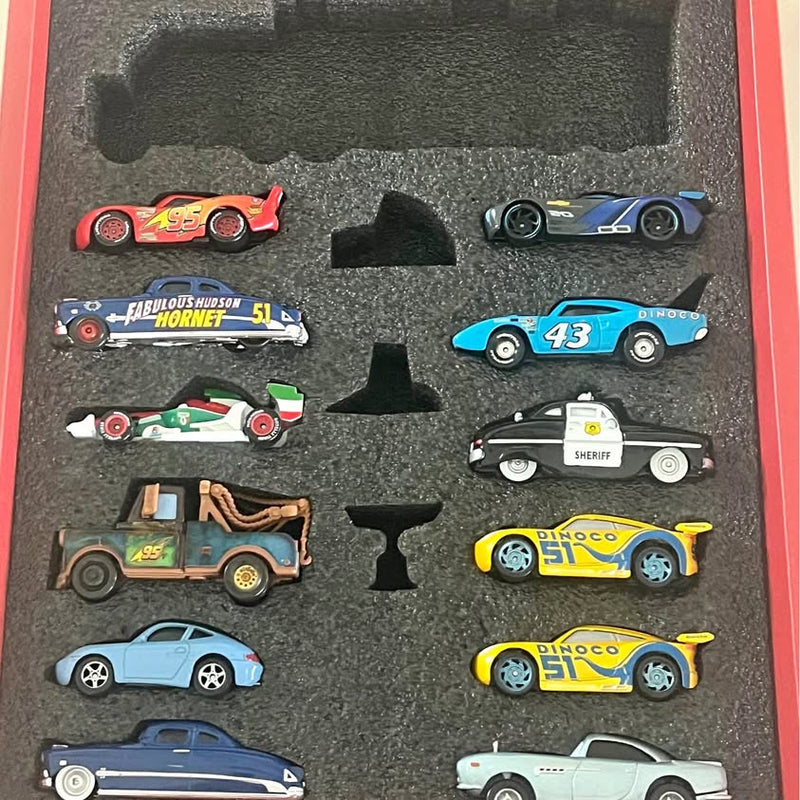 Diecast car vehicle set in gray foam tray, assorted racing cars and sheriff car