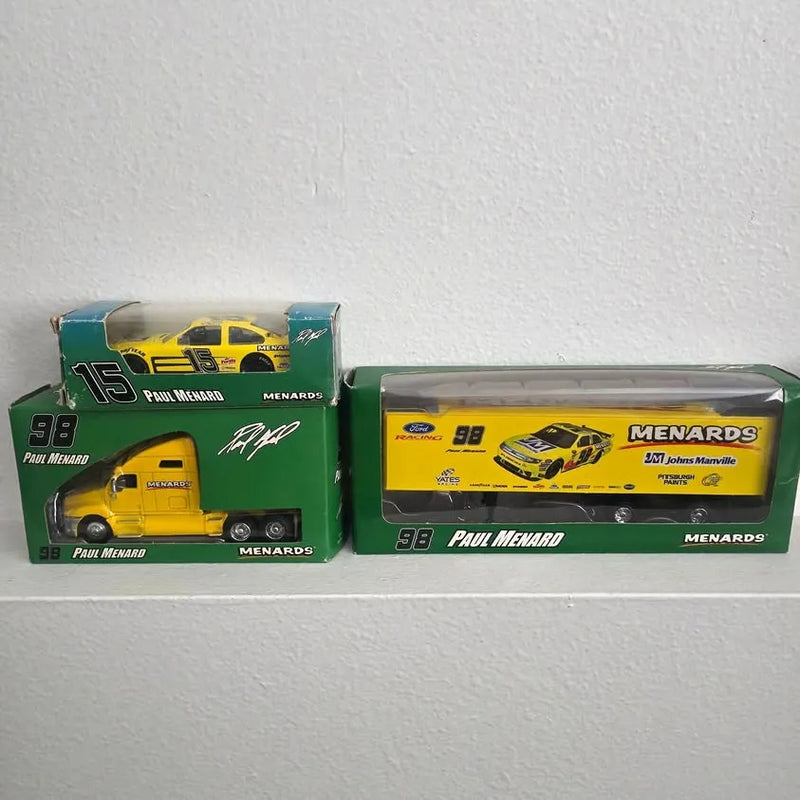 Collectible yellow diecast car in green Menards packaging, numbered 98, Paul Menard.