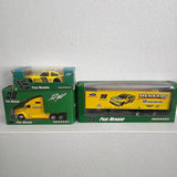 Collectible yellow diecast car in green Menards packaging, numbered 98, Paul Menard.