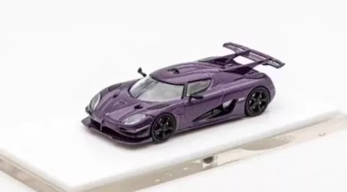 Purple diecast sports racing car model with black wheels on display base