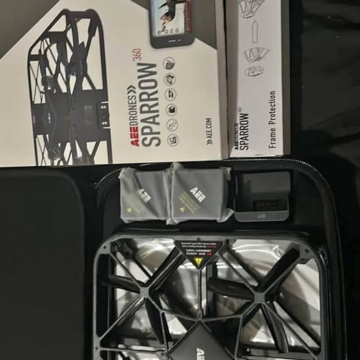 Drone in hard-shell protective case with folded arms
