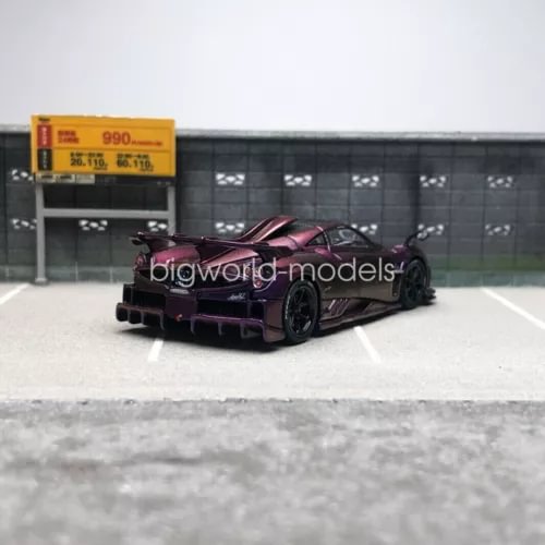 Purple diecast sports car model with black wheels, front 3/4 view