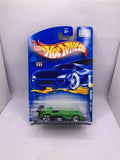 Hot Wheels diecast race car on blister card, green body with black details