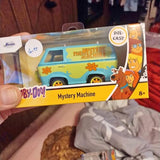 Die-cast Mystery Machine toy van in yellow retail box