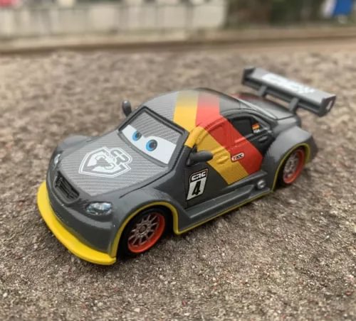Grey diecast race car with red and yellow stripe, No. 24, black wheels