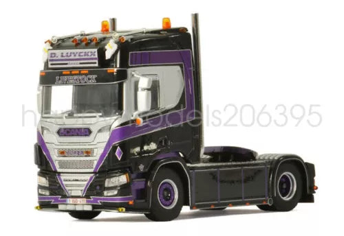 Purple diecast Scania R truck model cab, front view