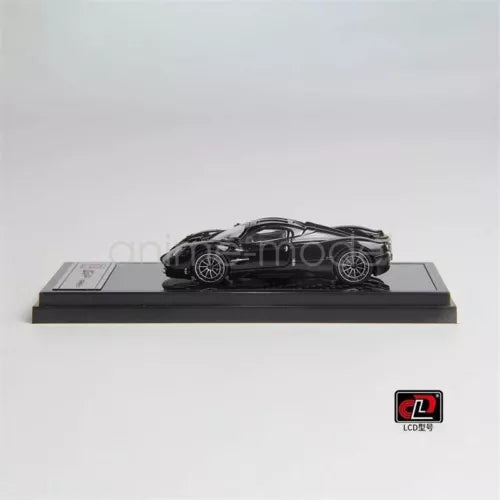 1:64 scale carbon black diecast model car on dark display base, side view