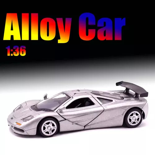 Silver alloy diecast model car with open cabin and rear spoiler, 1:36 scale