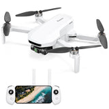 White quadcopter drone with gimbal camera and foldable propellers, plus controller with screen