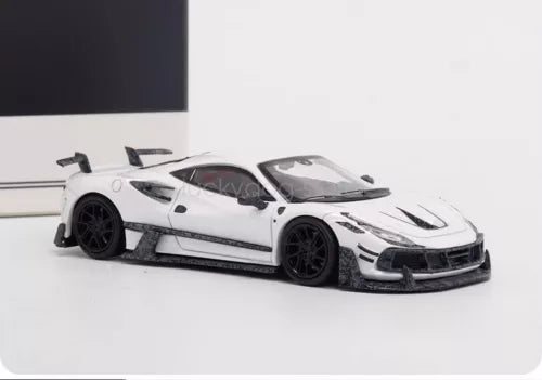 1/64 scale white diecast sports car with black wheels, front 3/4 view