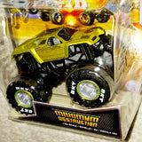 Yellow and black diecast monster truck with oversized tires, in clear blister packaging.