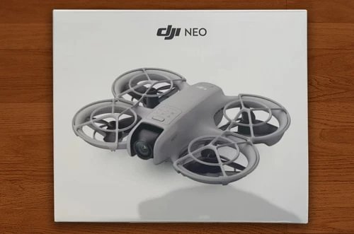 DJI NEO drone with four propellers on product box