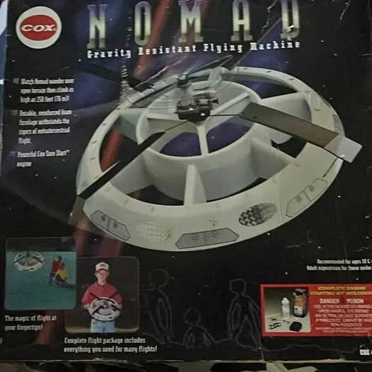 Gray gravity drone with circular propeller guards and central mount