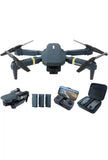Foldable quadcopter drone with camera and controller, shown with phone mount and case