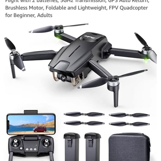 Black quadcopter mini drone with controller and spare propellers, foldable arms