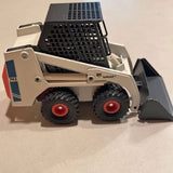 1:19 scale diecast skid-steer loader with front bucket and two treaded wheels