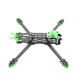 Carbon fiber quadcopter drone frame with green motor guards and four arms