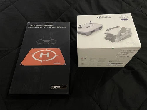 DJI Mini 3 drone kit box with landing pad and accessories