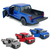 Diecast metal pickup toy shown in blue, with red and gray models in frame