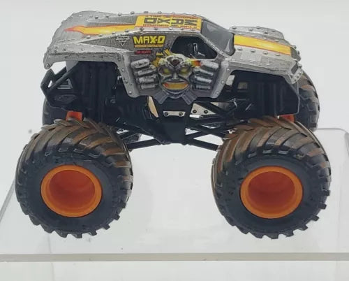 Gray monster truck diecast with large black wheels and orange rims, MAX-D styling