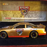 Gold Nascar Goodyear diecast race car with NASCAR Country and number 5D decals