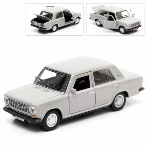 Light gray metal diecast classic sedan car, front three-quarter view