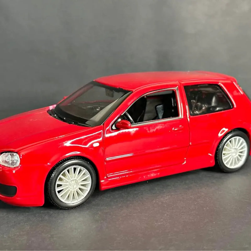 Red 1:24 scale diecast car with silver wheels, shown in side view
