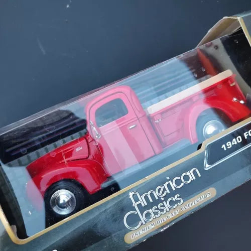 Pink 1940 Ford pickup diecast model in box with American Classics logo