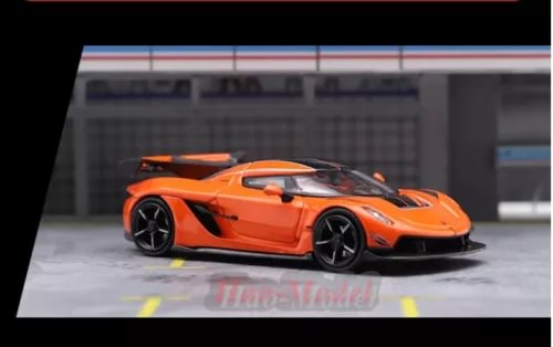 Koenigsegg Jesko Attack 1:64 diecast supercar, orange, black wheels, front 3/4 view